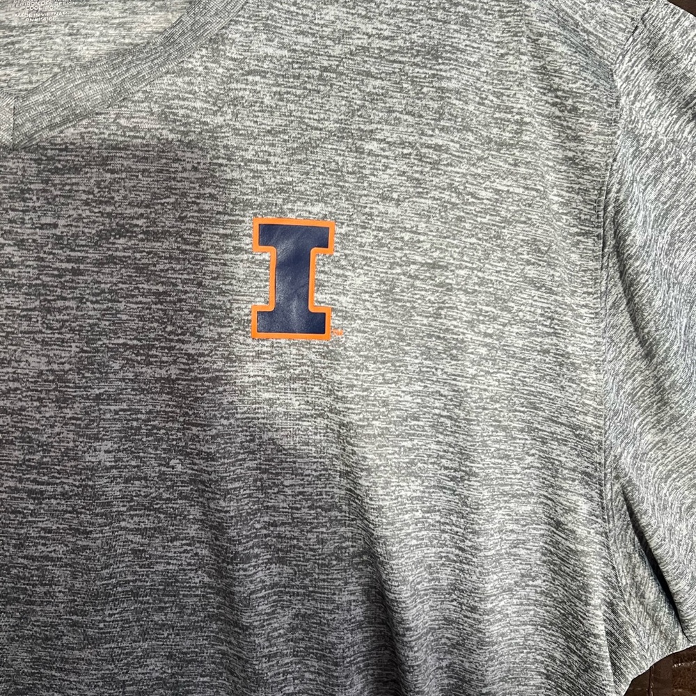 Colosseum XXL v-neck shirt. Slick feel of poly/spandex mix with the block I.